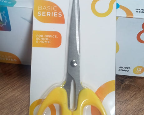 Stainless steel scissors with a focus on their sharp blades and ergonomic handle for precision cutting