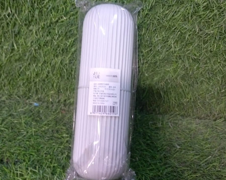 Versatile capsule bottle-shaped organizer, great for travel and storage.