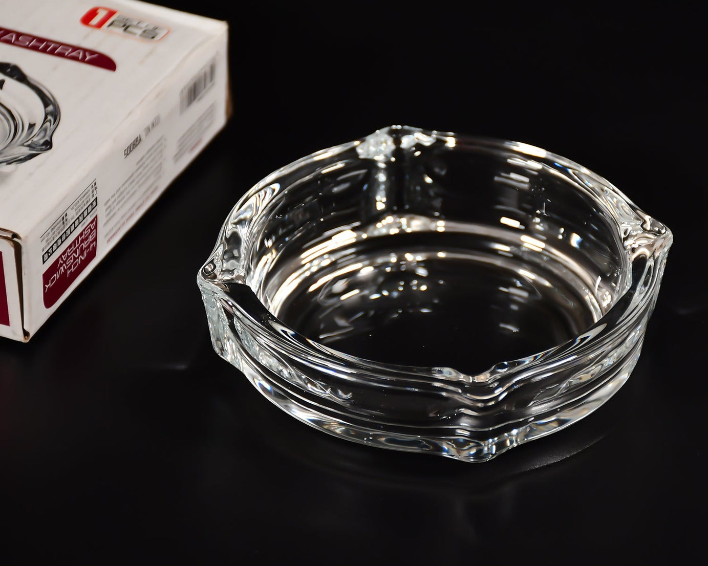 Crystal ashtray for cigars and cigarettes.