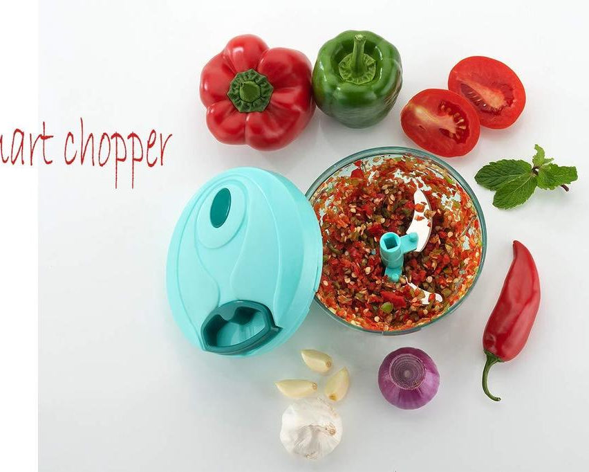 Hand-held vegetable chopper with stainless steel blades, detailed view.
