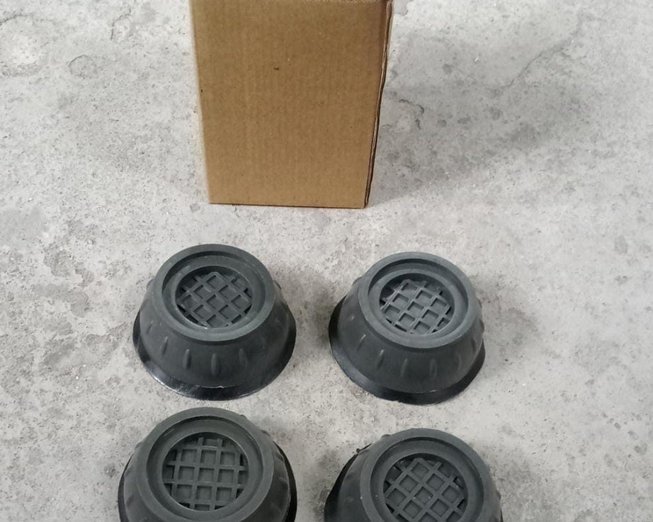 Machine leveling anti-walk pads, shock-absorbing base