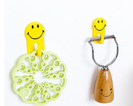 Adhesive hooks with smiley faces