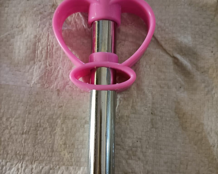 Heart-shaped mild steel gas lighter for convenient kitchen use and efficient ignition.