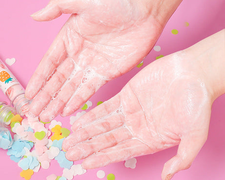 Paper soap strips in a flower shape, housed in a test tube.