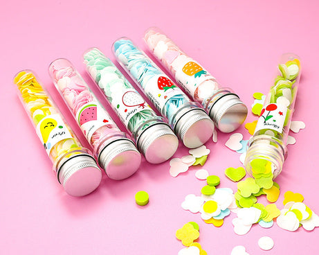 Travel-friendly test tube bottle with flower-shaped soap strips.