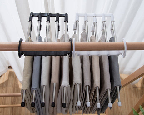 Space-saving trouser hanger with adjustable arms for versatile storage