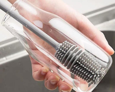 Multi-purpose cleaning brush for kitchen use.
