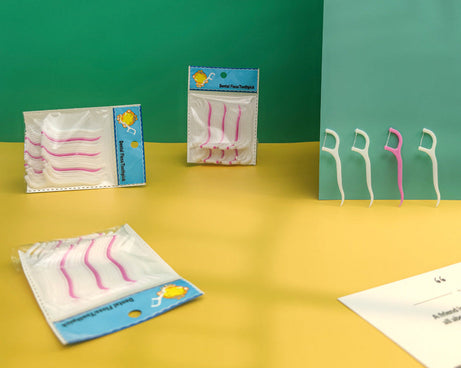 Dental floss toothpick sticks for easy oral care.