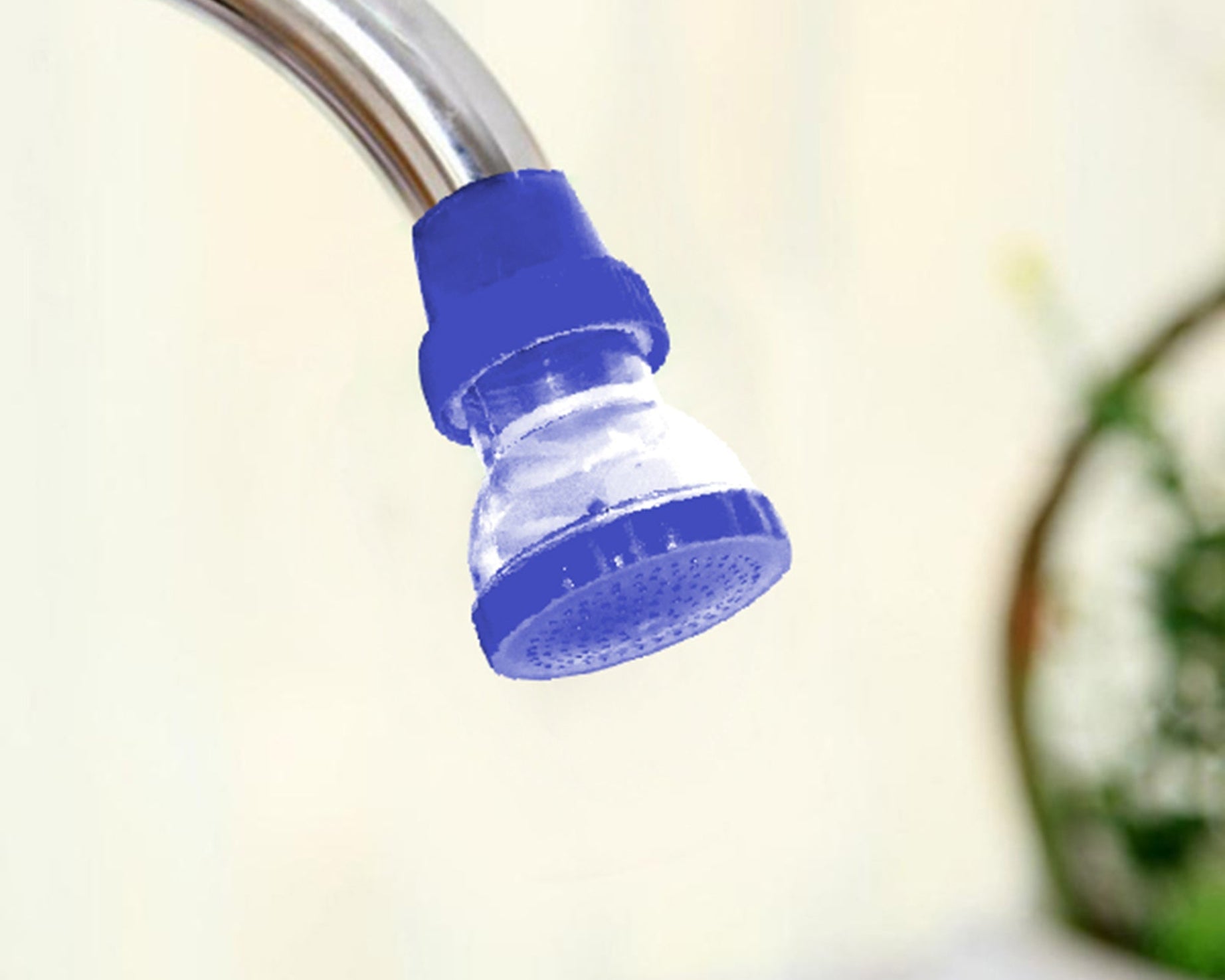 Plastic 360-degree shower head faucet, small size.