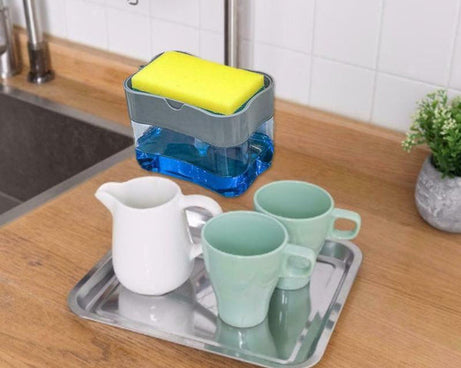 Compact countertop soap dispenser with sponge storage