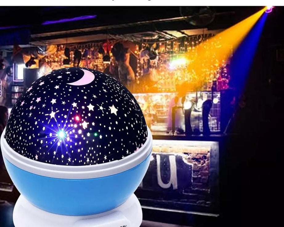 Rotating projection night lamp with star patterns