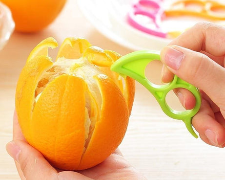Snail-shaped orange peeler, creative ring design.