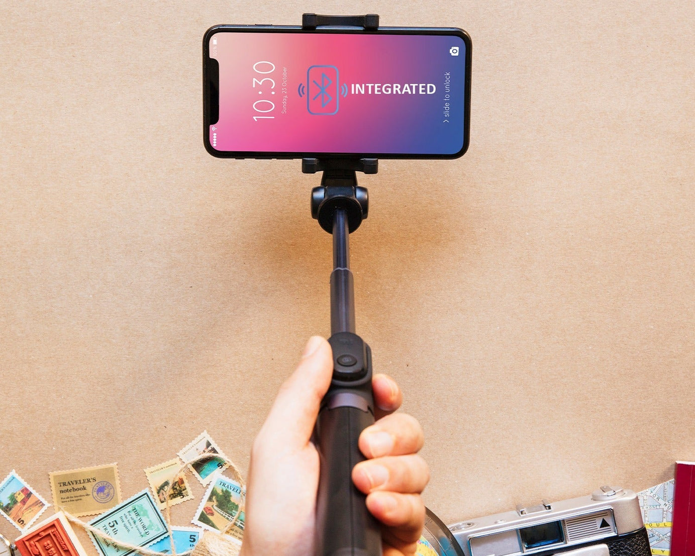 Folded selfie stick with phone holder and Bluetooth remote