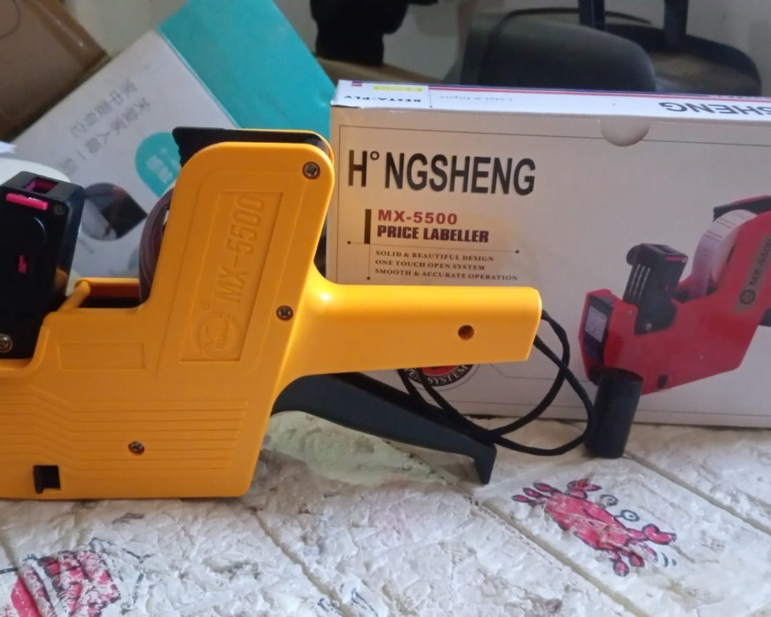 HAND HELD PLASTIC 8 DIGITS PRICE LABEL TAG GUN WIDELY USED IN DEPARTMENTAL STORES AND MARKETS FOR PRICE TAGGING AMONG CUSTOMERS.