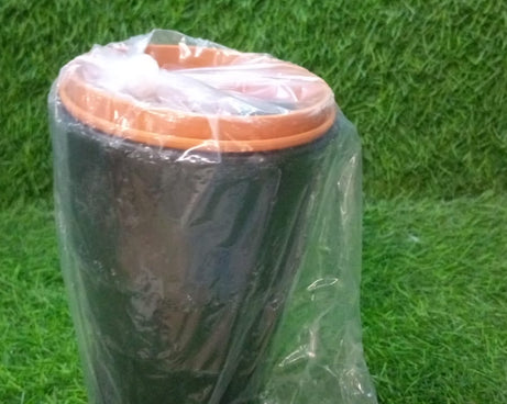 Car trash bin in use, illustrating practical application