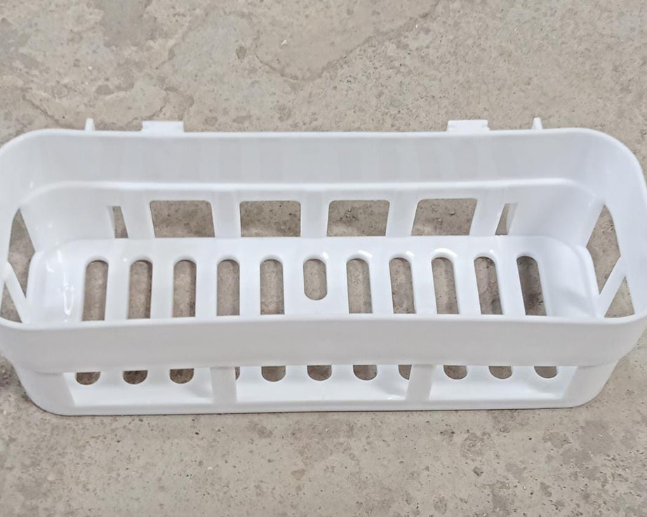 Plastic shower corner caddy with wall suction cup