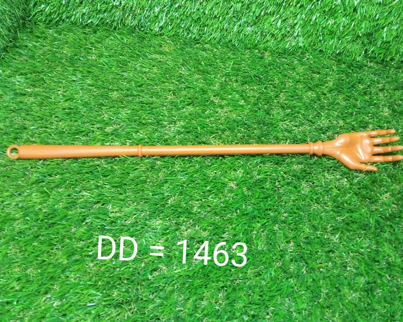 Khujli stick, plastic back scratcher and massage tool.