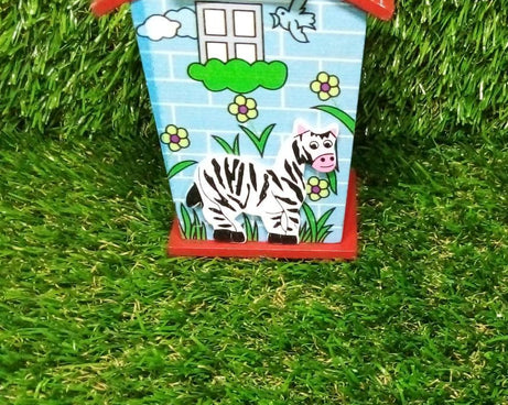 Piggy bank designed as a house