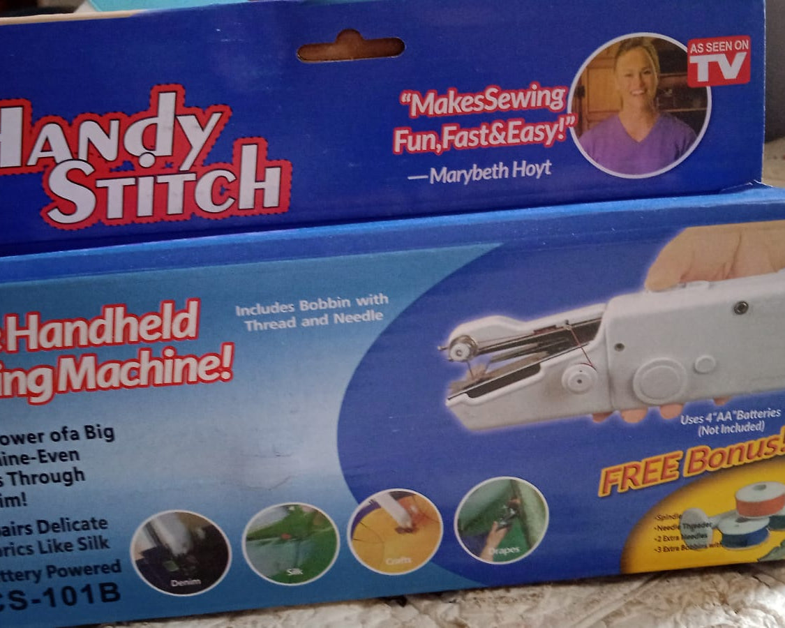 Mini sewing machine showing detailed view
