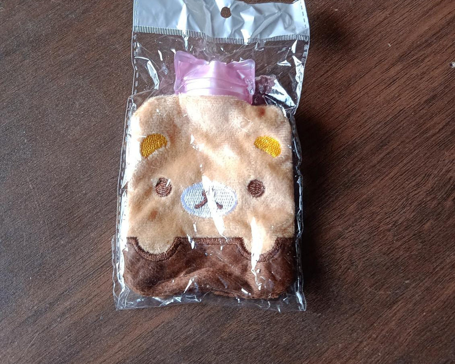 Small hot water bag with brown panda design for warmth