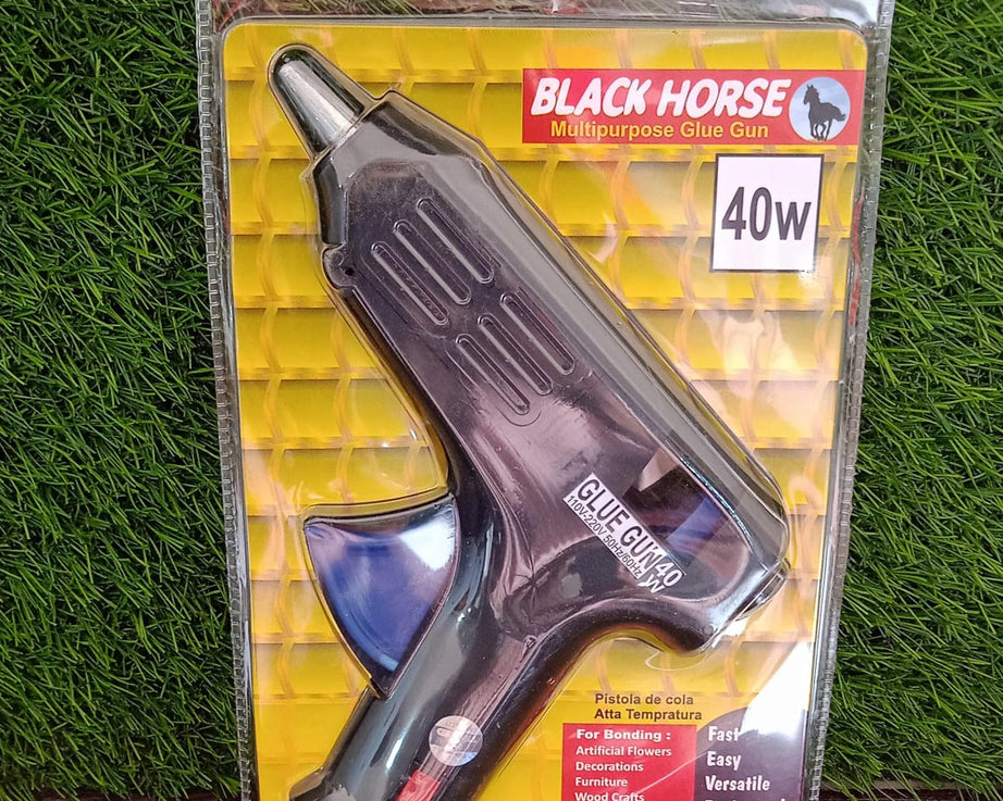 Glue gun with ergonomic design and 40 watt power.