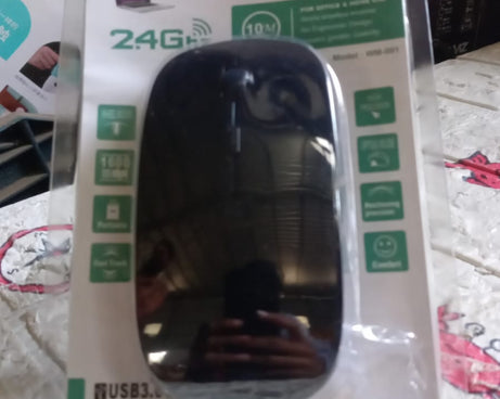 Sleek wireless mouse for home and office use, fits multiple devices.