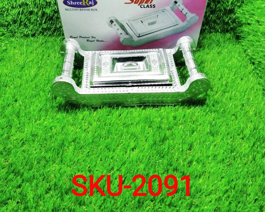 Multipurpose silver box with four sections for storage and gifting.
