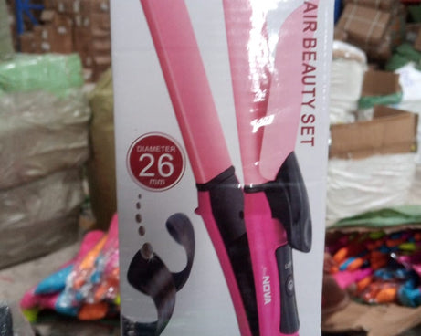 Multi-function hair straightener and curler.