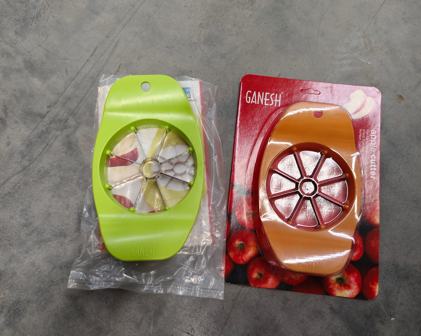 Ganesh apple cutter, plastic and stainless steel, various colors.