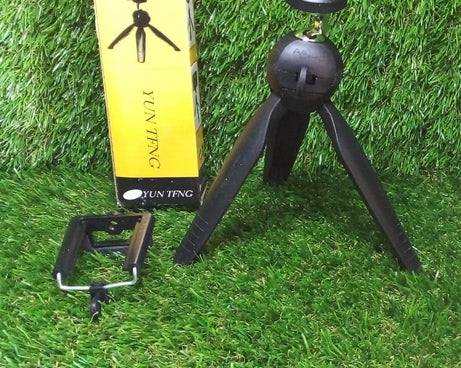 Mini tripod in use with camera