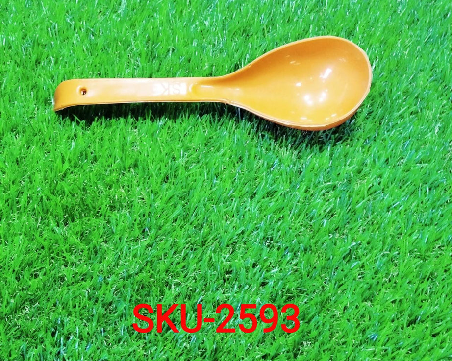 Plastic spoon for serving.