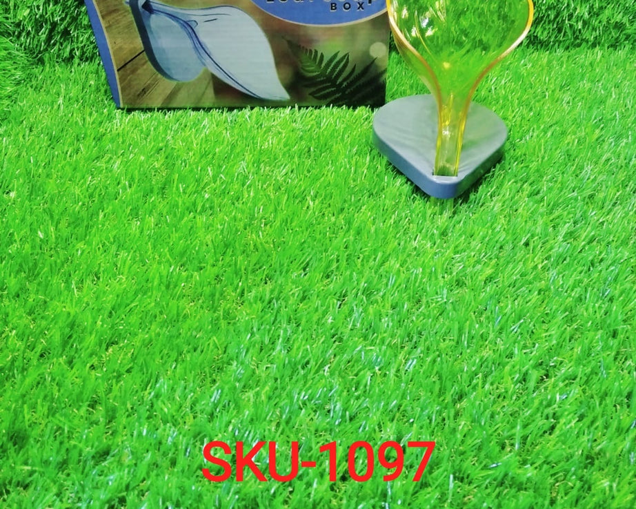 Leaf-shaped self-draining soap holder for bathrooms.