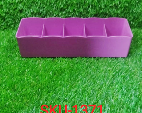 Colorful bead storage tray with clear plastic and multiple sections for easy access.
