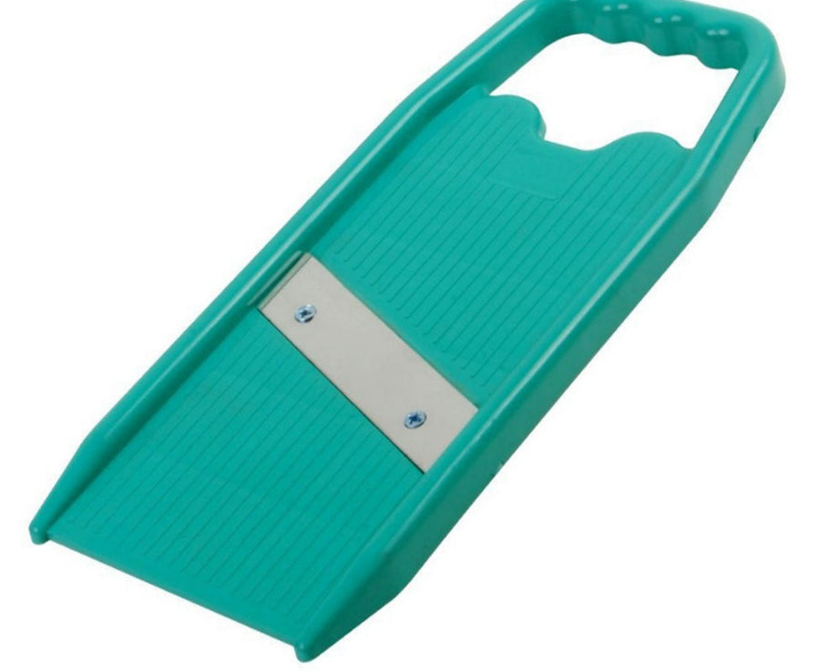 Manual fruit and vegetable slicer for easy and quick slicing of produce in the kitchen.